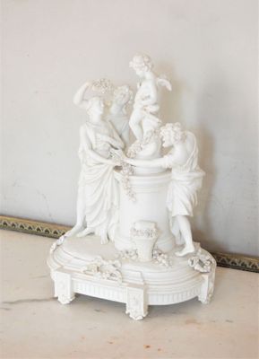 a statue that is sitting on top of a table
