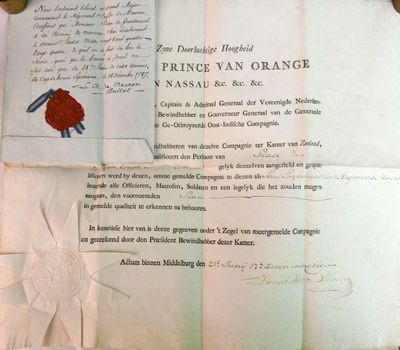 un morceau de papier portant un cachet de cire