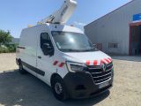 a white van parked in front of a building with a crane on top of it