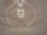 a wine glass that is sitting on a table