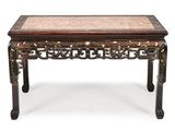 an oriental table with a marble top and wooden legs