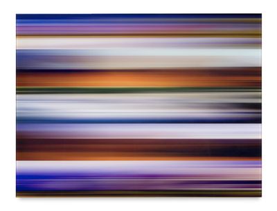 an abstract photograph of a blurry image of a blue and orange sky