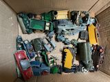 a box full of toy cars that are in it
