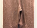 the bottom of a pair of brown sweatpants with a white background