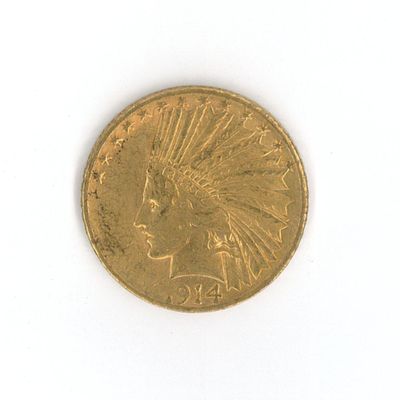 une pièce d'or sur laquelle est représentée une tête d'Indien