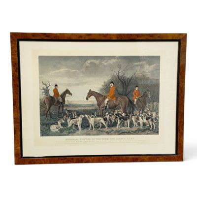 framed print of a group of men riding horses and dogs