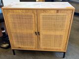 a wooden cabinet with two doors and a shelf on the side