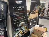 a large display of motorcycles in a showroom