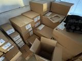a pile of boxes that are sitting on the floor