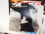a picture of a person holding a magazine in their hand