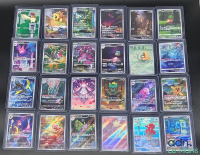 il y a plein de cartes Pokémon différentes dans la boîte
