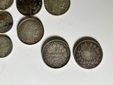 a lot of coins that are sitting on a table