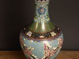 a vase that is sitting on a wooden table