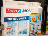 a box of tesa moll thermo cover next to a box of tesa moll