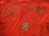 an image of a red jacket with a clover on it