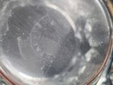 a close up of a glass of water on a table