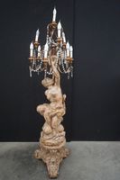 magnifique grand lampadaire en bois sculpté - soutenu par un…