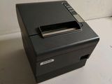 an image of a small printer sitting on top of a counter