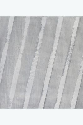 un gros plan sur un tapis à rayures