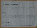a sign on the door of a building telling people to be aware of the dangers
