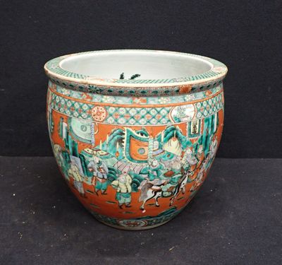 a vase with a painting on it on a black surface