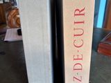 two books that are sitting on a table