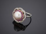 a pearl and diamond ring