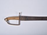 an image of a sword that is on a white surface