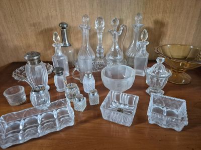 a table with a lot of glass items on it