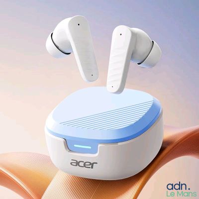 an image of a pair of airpods sitting on top of a chair