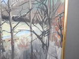 a picture of a painting hanging on a wall in a room