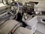 a car dashboard with a steering wheel and a dash board