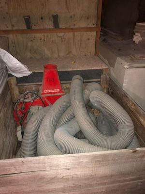 a box with a bunch of hoses inside of it