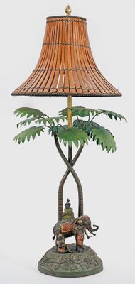 a lamp that is sitting on a table with a lamp shade on it