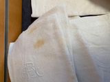 a towel that is laying on top of a bed