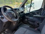 the interior of a van with the driver ' s seat down