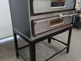 an image of three ovens stacked on top of each other