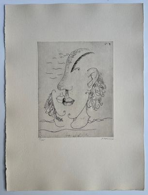 an image of a drawing of a woman ' s face on a piece of paper