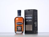 an image of a bottle of edbu whisky next to a box