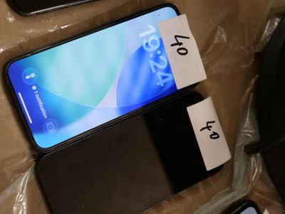 a phone that is sitting on a table with a price tag