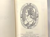 an open book with a picture of a woman on it