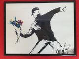 painting of a man throwing a bouquet of flowers in a red frame
