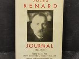 a book with a black and white photo of a man in a suit