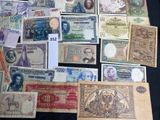 many different types of paper money on the table