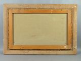 an old picture frame with a picture of a dog in it