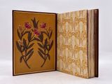 a book with a picture of flowers inside of it