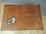 a wooden box with a picture of a man and a woman on it