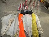 many umbrellas that are laying on the ground