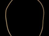 un collier en or sur fond noir