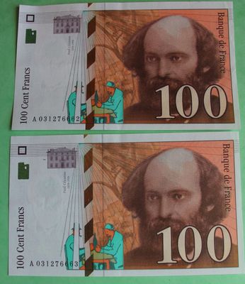 two bills with a picture of a man and a woman on them
